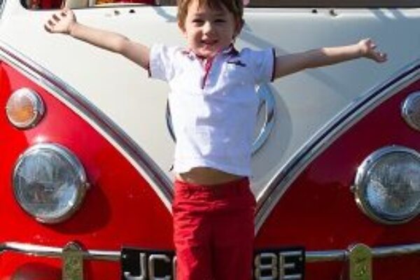 Boy smiling at Aircooled VW Show