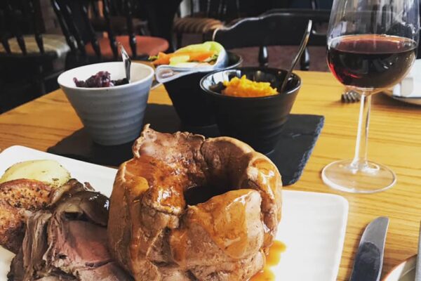 Sunday lunch, Yorkshire pudding and glass of red wine served at The Castle Inn Cawood Sunday lunch, Yorkshire pudding and glass of red wine served at The Castle Inn Cawood